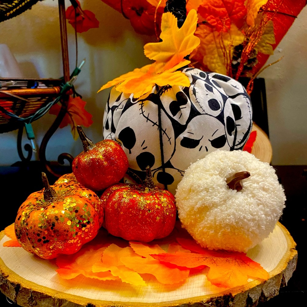 Handmade jack skeleton pumpkin on larg round wood